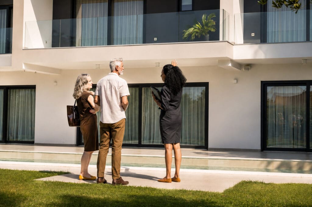 Tampa Bay buyer's agent showing a relocating couple a new construction home with pool – Elena Esquen Relocation Expert
